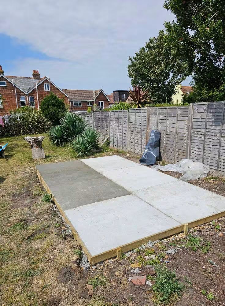 Concrete base laid in a timber frame in a garden