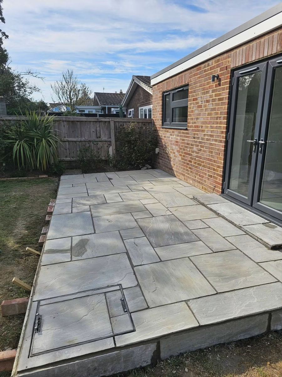 Newly laid paved patio outside patio doors
